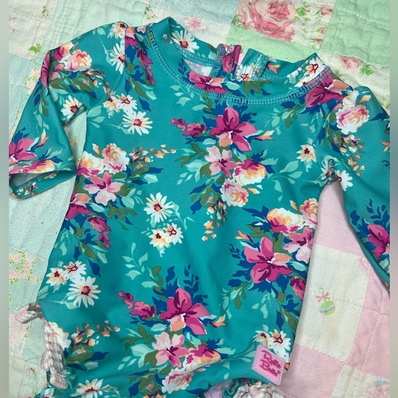 RuffleButts BabyLong Sleeve UPF50+ One Piece Rash Guard - Fancy Me Floral - Picture 3 of 7